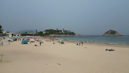 view of visitors at Shek O beach in Hong Kong , March 29 2024