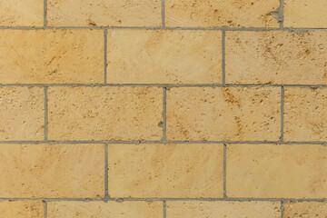 Brickwork brick masonry wall background architecture facade exterior building sand color limestone shellbrick