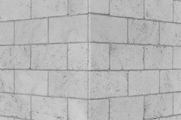 Brickwork brick masonry wall corner joint background architecture facade exterior building sand gray limestone shellbrick