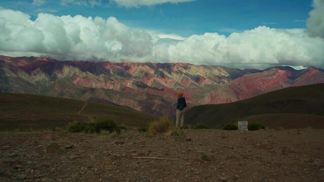 treveler in Cerro de los 14 Colores, or Fourteen Coloured Mountain, Serrania de Hornocal, Jujuy, Argentina
