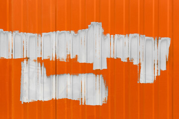 White paint abstract pattern brush stroke on metal orange fence blank space design text background empty