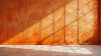 An orange textured wall casts luminous shadows, creating a monochromatic depth and delicate...