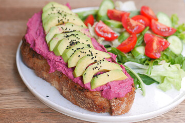 s sandwich with avocado and hummus on plate