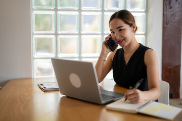 Businesswoman on Phone Call in Bright Office