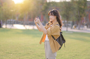 Traveler asian woman in her 30s explores the Grand Palace with a local guide. Uncover hidden gems and immerse yourself in Thai culture with her adventure.