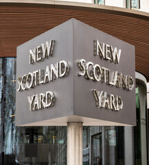 New Scotland Yard sign at the headquarters of the London Metropolitan police.