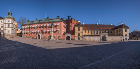 Panorama. Old 1700s court houses and archives buildings in the island Riddarholmen in Stockholm a sunny spring day