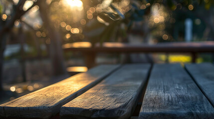 Wooden bench in the park during sunset