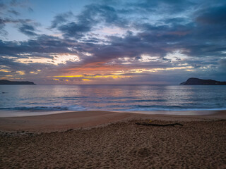 After the rain sunrise at the seaside