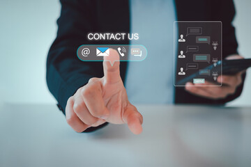 Communication and Contact us or Customer support hotline people connect. Hand using a laptop and touching on virtual screen contact icons, email and address, live chat with Ai internet.