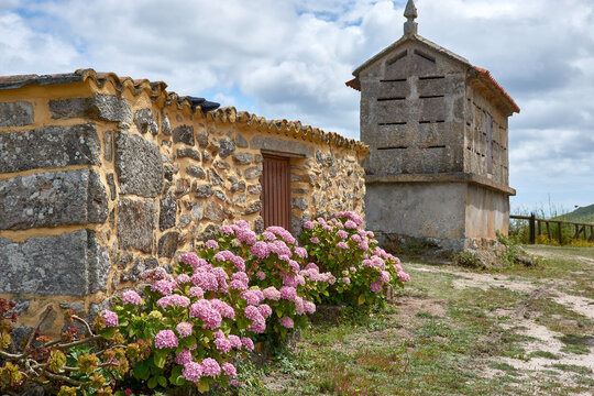 Small house with its horreo on the Island of Ons in Galicia, Spain