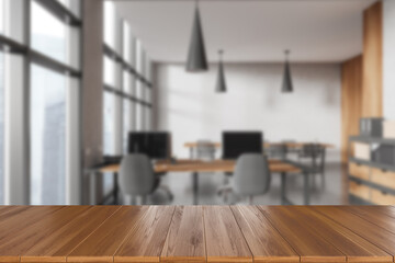 Empty wooden desk and office room interior with furniture and window, mockup