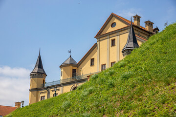 Fototapeta premium Travel and tourist destination concepts. The famous Nesvizh Castle as a deep example of the medieval heritage and residence of the Radziwill family.