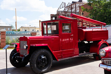 Old Russian, fire truck of red color. Exhibition copy.