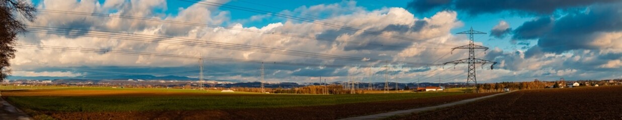 High resolution stitched winter panorama with overland high voltage lines at Wallerdorf, Kuenzing, Deggendorf, Bavaria, Germany