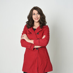 head and shoulders close up portrait of beautiful brunette woman model, wearing red trench coat...