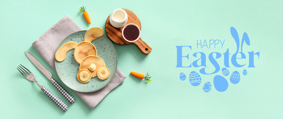 Funny Easter bunny pancakes with carrot on turquoise background
