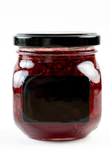 jar of raspberry jam on white background