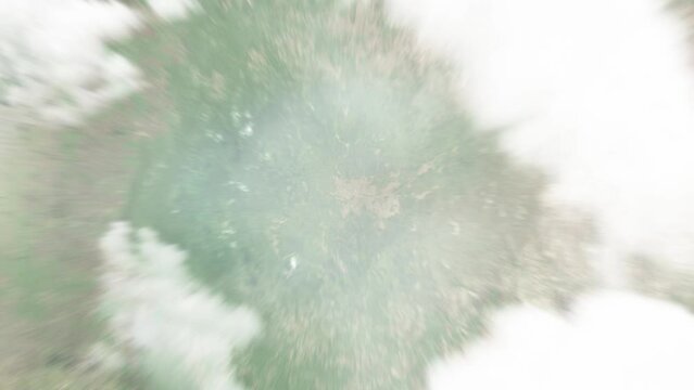 Earth zoom in from space to Gabela, Angola. Followed by zoom out through clouds and atmosphere into space. Satellite view. Travel intro. Images from NASA