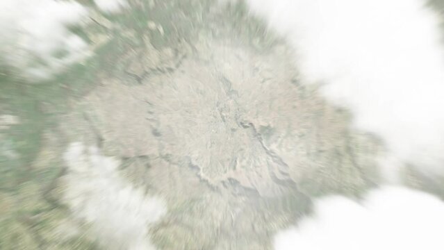 Earth zoom in from space to Butha Buthe, Lesotho. Followed by zoom out through clouds and atmosphere into space. Satellite view. Travel intro. Images from NASA