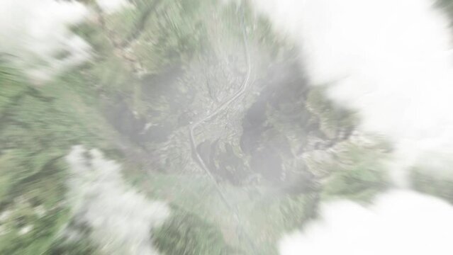 Earth zoom in from space to Balzers, Liechtenstein. Followed by zoom out through clouds and atmosphere into space. Satellite view. Travel intro. Images from NASA
