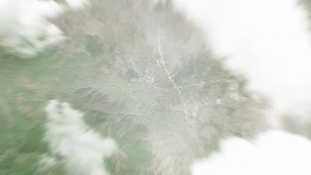 Earth zoom in from space to Ferizaj, Kosovo. Followed by zoom out through clouds and atmosphere into space. Satellite view. Travel intro. Images from NASA
