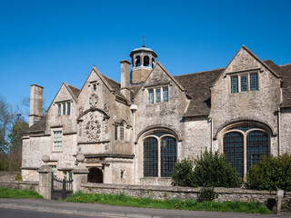 Fototapeta na wymiar The heritage building of Hungerford Almshouses in Corsham, England, also known as Lady Margaret Schoolroom, is operated as a visitor attraction.