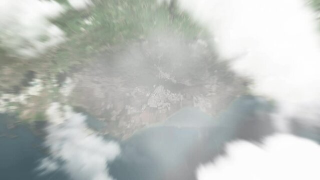 Earth zoom in from space to Guayama, Puerto Rico. Followed by zoom out through clouds and atmosphere into space. Satellite view. Travel intro. Images from NASA