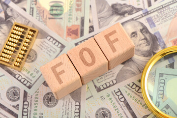 There are blocks with FOF letters printed on the US dollar props