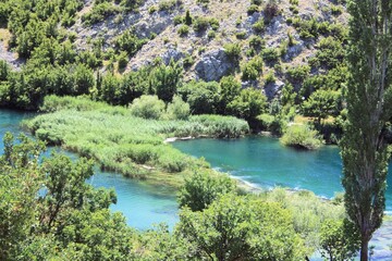 Fototapeta na wymiar the blue waters of the Zrmanja river, Croatia