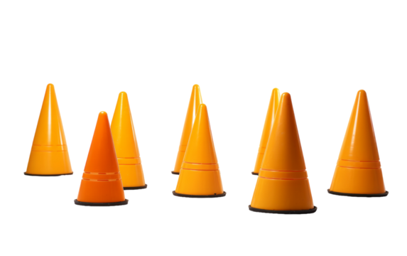 A group of orange cones sitting closely next to each other
