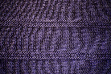 Handmade dark blue knitting wool texture background.