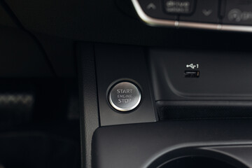 Luxury car engine start and stop button