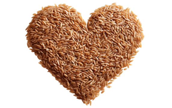 A heart shape formed by tiny grains on a white surface