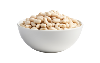 A white bowl brimming with beans rests atop a pristine white table