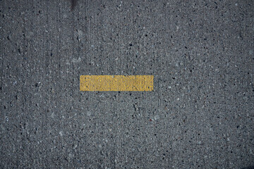 Fototapeta premium yellow marking on asphalt