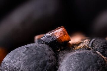 Vanadinite orange crystal on hematite from Morocco. macro photography detail texture background....