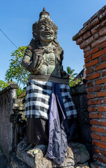 Fototapeta na wymiar Ancient sculptures in the city of Ubud on the island of Bali, Indonesia.