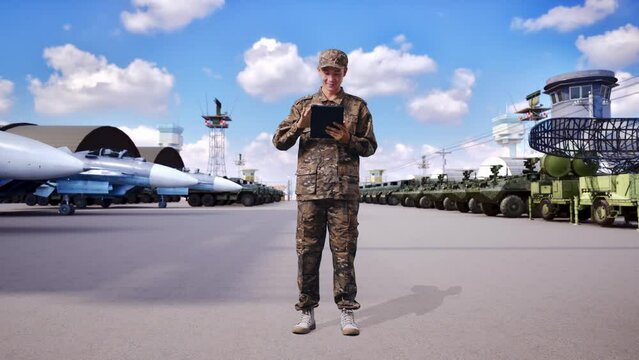 Full Body Of Asian Man Soldier Using A Tablet While Standing At Military Camp