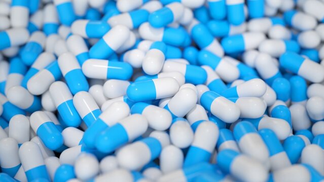 Blue and white capsules in a close-up, 3D animation