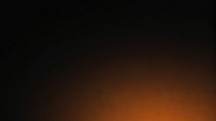 Dynamic Contrast Vibrant Orange and Black Gradient Background with Grainy Texture for Web Banner