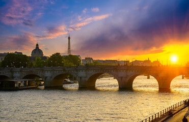 Pont Neuf  is the oldest standing bridge across the river Seine in Paris, France. Sunset cityscape of Paris. Architecture and landmarks of Paris - 772216009