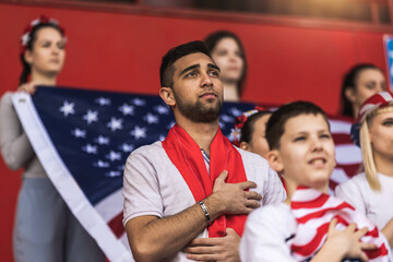American football / soccer fans singing anthem at the stadium