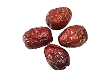 four of dry jujube on white background