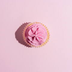 Colorful celebration background with cupcake. Minimal party concept.