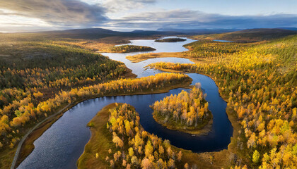 Drone capture of the Vistasjakka River, showcasing its meandering path, adjacent lakes, birch trees lining the banks, and colorful autumn scenery near Nikkaluokta in Norrbotten County, northern Sweden