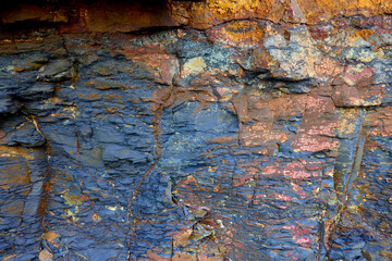 Rocks are naturally occurring solid aggregates of minerals, or in some cases, non-mineral solids like volcanic glass or coal. They are the fundamental units of Earth's crust