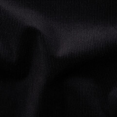 Black satin fabric texture background. Close up