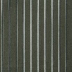 Closeup detail of striped fabric texture background. Vertical stripes pattern