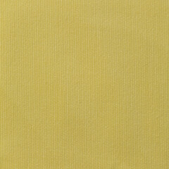 Texture, background, pattern. Yellow fabric is crumpled. Crumpled yellow fabric